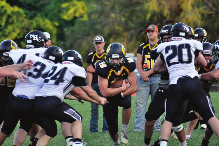 SOPHOMORE RUNNING BACK Jaxon Miller sees a hole in the line during Orrick’s preseason jamboree scrimmage with Norborne Hardin-Central Aug. 20 at Braymer. SHAWN RONEY | Staff