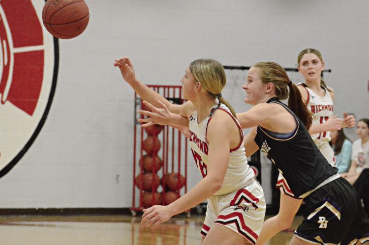 LIKE THE BASKETBALL in this Jan. 4 photo, shown during Richmond’s home varsity girls meeting with Pleasant Hill, Ray County’s prep sports programs have found themselves up in the air, wondering when they’ll face interscholastic competition again because of the latest winter weather. SHAWN RONEY | Staff