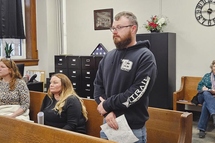 CHRIS CROWLEY presents a petition to vacate a portion of Vroom Road. MIRANDA JAMISON | Staff