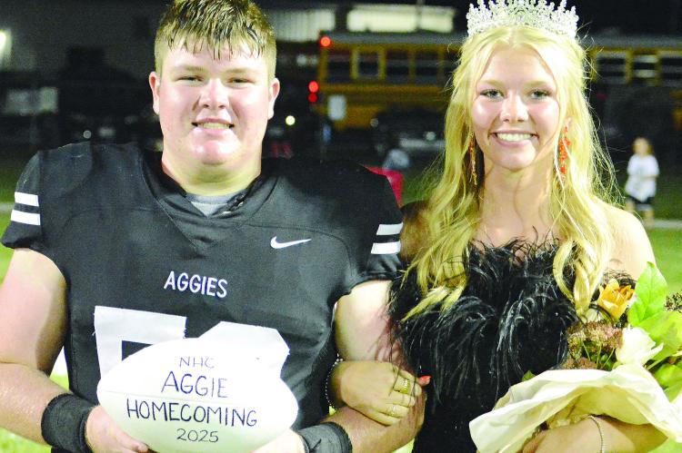THE 2025 HARDIN-CENTRAL homecoming king and queen –– Jace McNelly (left) and Kelsey Nolker –– were crowned after Norborne Hardin-Central’s 61-30 win over Slater/Malta Bend in varsity football. Game coverage continues on page 11. SHAWN RONEY | Staff