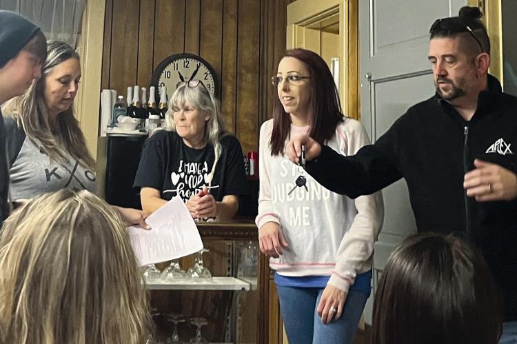APEX PARANORMAL (AP) members Lillian Buchholz (from left), Jenni Panethiere, Ray County Museum Director Cathy Gottsch, AP members Shannon Johnson and Elijah Buchholz discuss ghost hunting rules and stories from their past adventures. SOPHIA BALES | Staff
