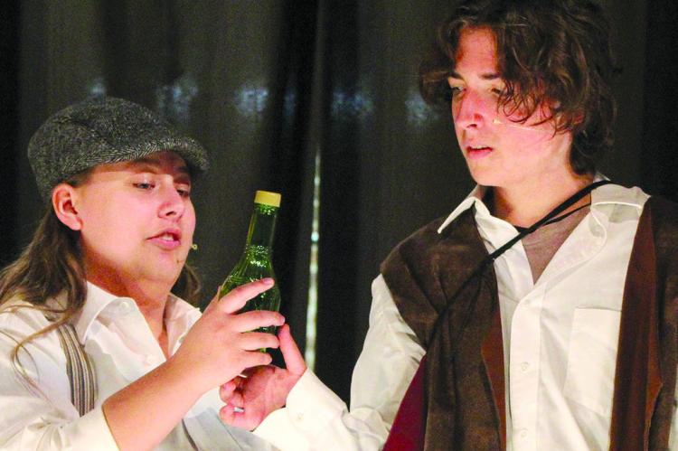 AVERY OGLE (left) as the Mantu Newsie and Ashton Estep as Romeo rehearse a scene during the school play. SHARON DONAT | Staff