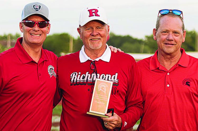 GREGG STEELE (center) is recognized for decades of contributions to Richmond athletic programs. Submitted