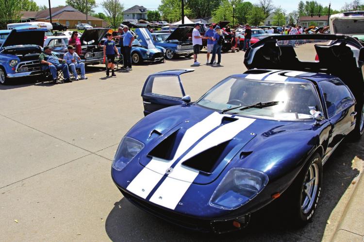 VINTAGE and modern vehicles drive guests to the car show during the 40th Annual Richmond Mushroom Festival in the municipal center parking lot. J.C. VENTIMIGLIA | Staff