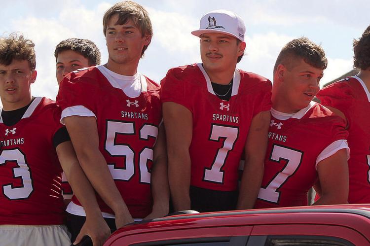 JOINING IN HOMECOMING PARADE activities are Richmond football players Jayden Pearson (from left), Mattox McCloud, Luke Gifford, Jack Green, Carson Seek and Nathan Nichols. SHARON DONAT | Staff