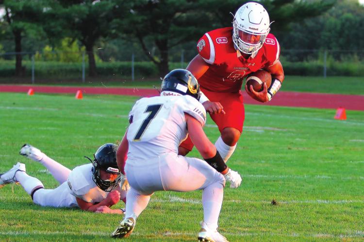 AFTER LATHROP buries Richmond with season-ending defeats in 2018 and 2019, the Spartans come out looking for payback Aug. 28 against the visiting Mules in the season opener. Richmond junior quarterback Keyshaun Elliott has a banner day, throwing and rushing for touchdowns in the 44-6 win. J.C. VENTIMIGLIA | Staff