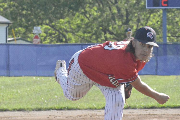 NOAH STEVENS-BREHM, a first-year high schooler, watches one of his pitches sail toward the plate during Richmond’s May 3 Missouri River Valley Conference-East Division road meeting with Lexington. SHAWN RONEY | Staff