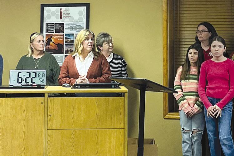 MALLORY COLE (from left), Staci Maddux, Brenda Hamm, Candice Schroeder, Harper Hockemeier, Emerson Mueller, Shari Donalson and Sophia Dorton present their Richmond Middle School highlights. SOPHIA BALES | Staff