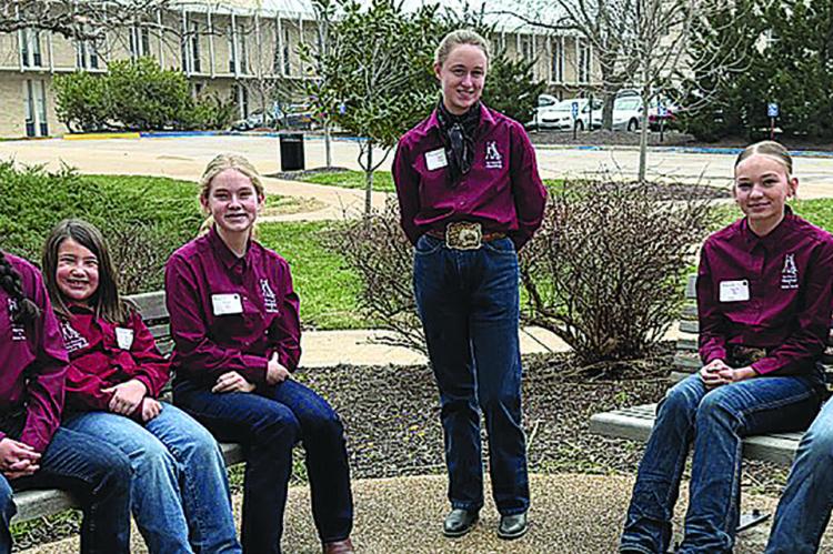 THE HIPPOLOGY TEAM takes a break to enjoy the weather during the competition. Pictured above are Guido Giarratana (from left), Zoraya Martin, Mia Richwa, Savanna Dixon, JoLynn Scott, Cheyanne Skaggs, Addie Bilbrey and Darcy Bilbrey. Submitted