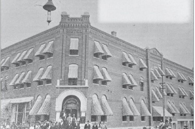 The first carbon lights of Richmond sway gently in the breeze. This one was suspended by wires from the buildings on the four corners and was lowered daily by the “lamp tender” to have the carbon replaced. Submitted