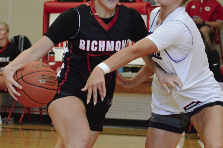 RICHMOND VARSITY girls basketball coach Kaylee Vantrump expects Adilyn Swope (left) to be the Spartans’ floor general this season. SHAWN RONEY | Staff