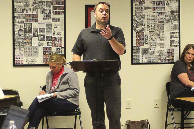 INCOMING Richmond High School Principal Justin Remington talks to the Board of Education about graduation dates and photo sessions for graduates. J.C. VENTIMIGLIA | Staff
