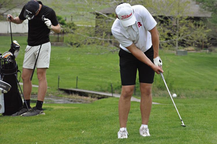 RICHMOND SENIOR Thomas Murphy attempts a chip shot late in his round April 28 at the Richmond Invitational at Shirkey Golf Course. SHAWN RONEY | Staff