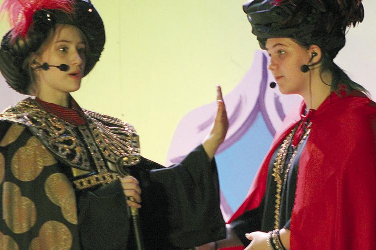 KAMERON POKEY (left) and Elaine Borchert perform together on stage before the opening night of Aladdin. SHARON DONAT | Staff