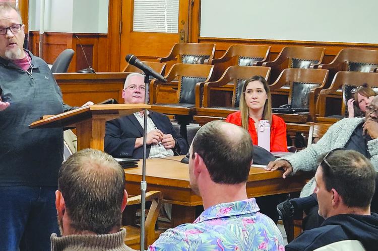 CHAD JUDD (left), a 2018 graduate of the Ray County Adult Drug Court, shares his story of relapse, recovery and gratitude during the program’s 39th graduation ceremony. MIRANDA JAMISON | Staff