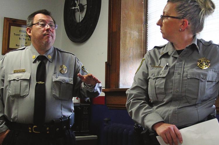 UNDERSHERIFF Steve Mendoza says putting the issue on the ballot lets the public decide whether or not to support building a new jail. Capt. Andraya Kreiling, right, holds a copy of the jail tax ballot language. J.C. VENTIMIGLIA | Staff