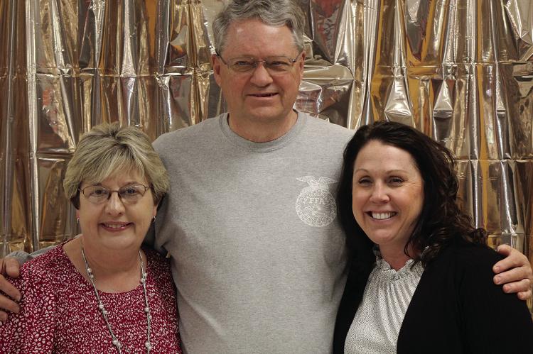 RMS MATH TEACHER Brenda Hamm (from left), RMS and RHS agriculture teacher Charles Foreman and RMS science teacher Christina McClure are honored at the end-of-the-school-year retirement party. SHARON DONAT | Staff
