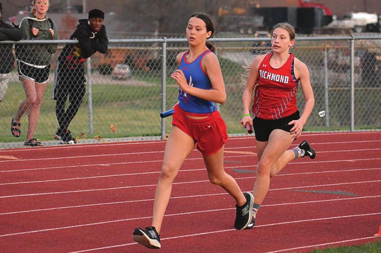 SOME TIME after helping Richmond win the girls 800-meter relay and take second in the 400 relay, sophomore Brook Weber runs a leg of the 1,600 relay at the Hoot Middleton Invitational on Tuesday at Richmond High School. SHAWN RONEY | Staff
