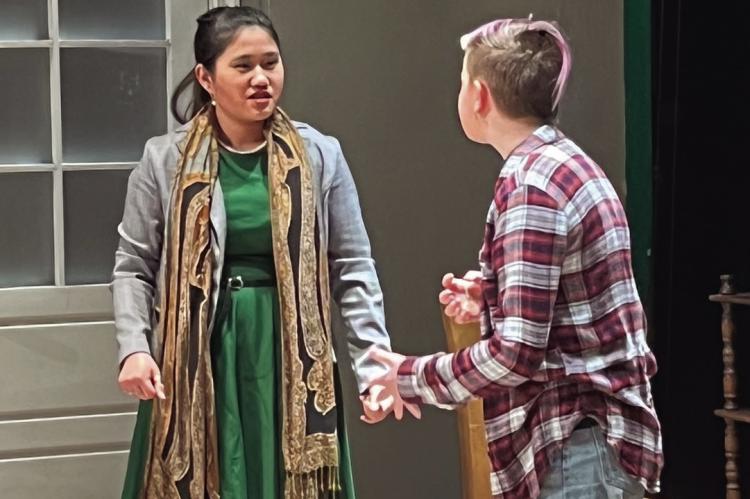 ASPEN ERSKINE AND MARLIE MCADAMS are contributing characters to the Richmond High School spring play “ 12 Incompetent Jurors” by Ian McWethy. The first showing is at 7 p.m. Friday at the Farris Theatre on Main Street. See page 12 for story and additional photos. SOPHIA BALES | Staff