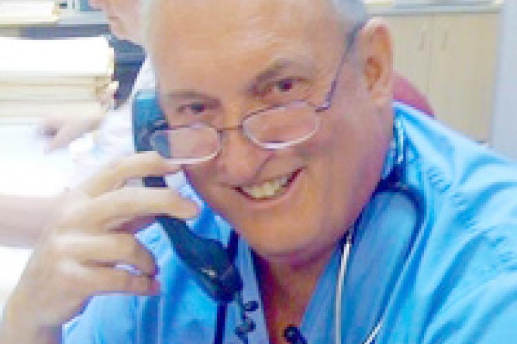 John Edward Scowley, M.D.