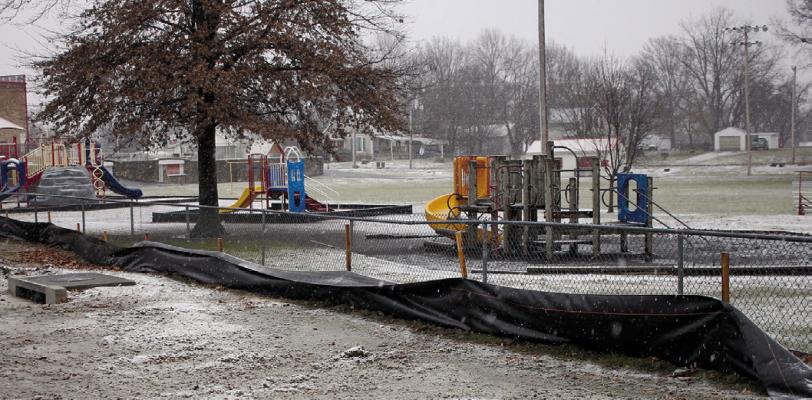 BLACK TARP was placed to keep debris away from areas the youth play at Dear Elementary. SOPHIA BALES | Staff