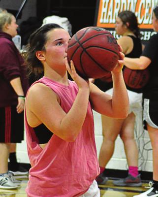 HARDIN-CENTRAL SENIOR Brogan DeMint practices free throws as she takes a one-day-at-a-time approach to the varsity girls basketball season. SHAWN RONEY | Staff