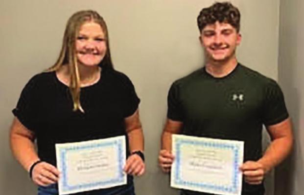 HARDIN-CENTRAL High School student Morgan Finley and Richmond High School’s Blake Logsdon receive this year’s Ray County Fair Harold Strobel Citizen of Service Awards.