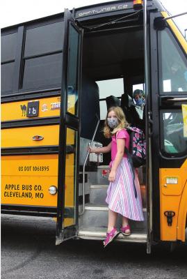 J.C. VENTIMIGLIA | Staff STUDENT Averie Goetz, 8, rides on a bus that has been safety inspected by the Missouri Highway Patrol.