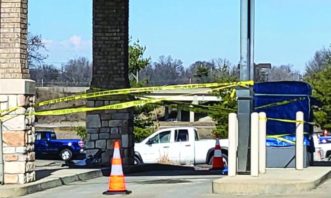 RICHMOND COMMUNITY BANK of Missouri ATM area is taped off with yellow police tape. SHARON DONAT | Staff