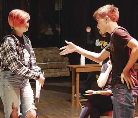 TIMOTHY VAUGHN (left) and Marlie McAdams rehearse for the Richmond High School’s representation of “The Alibis,” a comedic murder mystery play written by Johnathan Dorf. The first showing is today at 7 p.m. inside the Farris Theater in Richmond. The Saturday, Nov. 4 show is 7 p.m. while the Nov. 4 showing is at 2 p.m. SOPHIA BALES | Staff