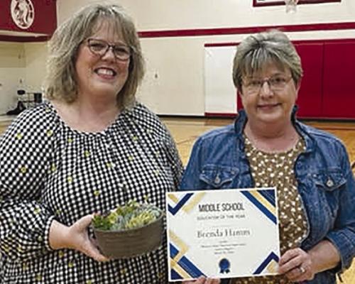 President of the Missouri State Teachers Association Michelle Krog (left) awards Richmond Middle School teacher Brenda Hamm the Educator of the Year Award. | Submiitted