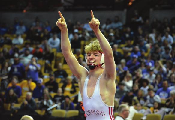 SENIOR CONNER TEAT celebrates after a victory during the Class 1 state boys wrestling tournament. He finishes third in the 132-pound division. SHAWN RONEY | Staff