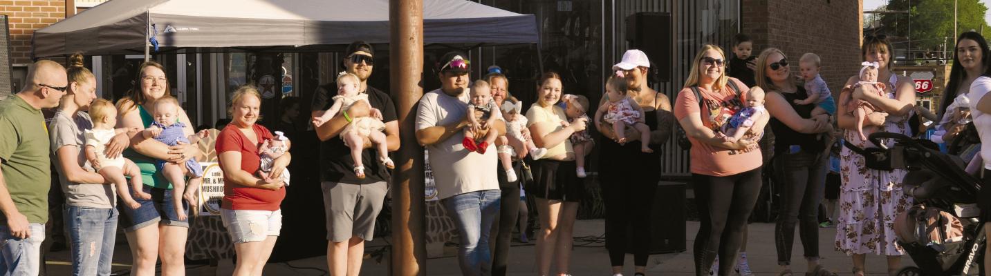 FAMILIES EAGERLY await the results of the Mr. and Mrs. Mushroom Contest. KAITLYN RIDDLE | Staff
