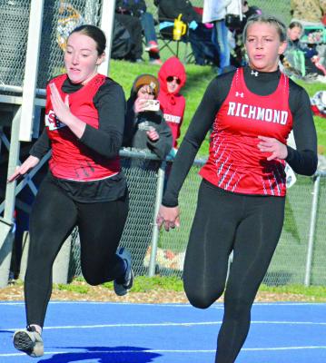 SENIOR KAYLEE PUGH (right) fights for position during the girls 100-meter dash. She wins the race in 13.62 seconds.