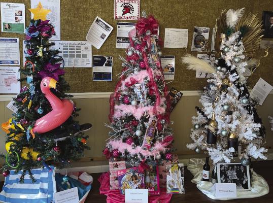 THE CITY OF Richmond (from left), Edward Jones, and the Richmond News decorated its trees for the Richmond Area Chamber of Commerce Annual Christmas Tree Raffle. SOPHIA BALES | Staff