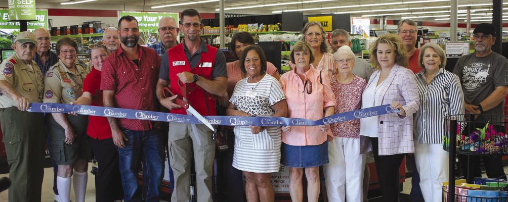 LOCAL COMMUNITY members and stakeholders participate in Tractor Supply Co. ribbon cutting last week. SOPHIA BALES | Staff