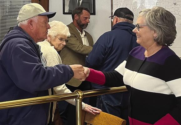DISTRICT 7 STATE Representative Peggy McGaugh (right) meets with Hardin residents about State Hwy A at last week’s Ray County Commissioners meeting. SOPHIA BALES | Staff