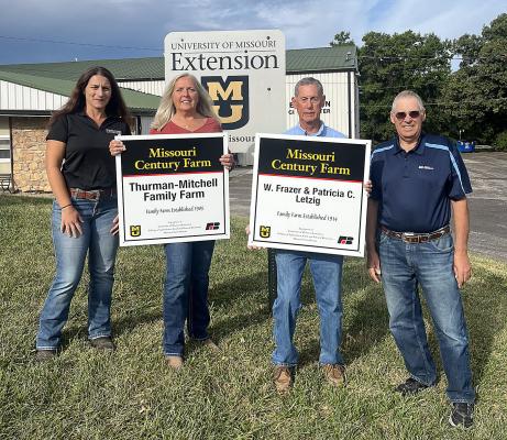 THE THURMAN-MITCHELL FAMILY FARM, managed by Sandra Williams, second from left, and W. Frazer (second from right) and Patricia C. Letzig, received the Missouri Century Farm Award this year. Katie Nerner of the University of Missouri Extension, left, and Jim Proffitt of the Missouri Farm Bureau presented the awards honoring families who have been farming in rural communities for at least 100 years. SOPHIA BALES | Staff