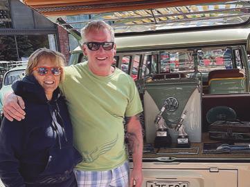 Vicki and Paul Comeau with their VW bus, which was purchased by their late son, Kyle, and restored by Vicki and Paul. They won three awards, displayed in the bus rear, at the Smithville Volkswagen show in May. LIZ JOHNSON | Submitted