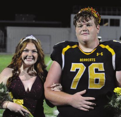 SAVANNAH BARTLEY and Ross Greer are crowned homecoming queen and king Sept. 17 during halftime of the Orrick High School football team’s 90-58 victory over Braymer/Breckenridge, a win coach Kirk Thacker considers the Bearcats fortunate to secure. SHAWN RONEY | Staff