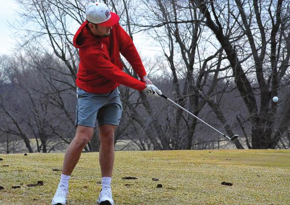 MOVING FROM the hardwood to the fairway, Richmond senior Collin Cromley works on his short game March 14 at Shirkey Golf Course. SHAWN RONEY | Staff