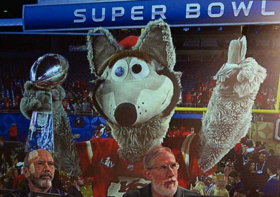 A PROJECTION during the annual Mayor’s Prayer Breakfast shows KC Wolf holding the Super Bowl trophy won in February by the Kansas City Chiefs. J.C. VENTIMIGLIA | Staff