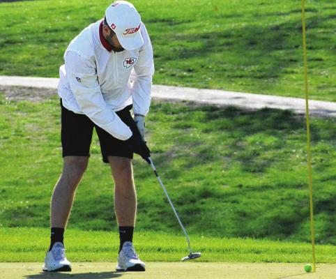 RICHMOND SENIOR Collin Cromley sinks a putt Monday, also Senior Day for the Spartans, during triangular play with Orrick and Knob Noster at Shirkey Golf Course. SHAWN RONEY | Staff
