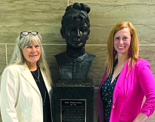 RAY COUNTY MUSEUM administrator Cathy Gottsch (left) and Ray County Prosecutor and Historical Society Board Member Camille Johnston stand with the newly-inducted bust of Marie Watkins Oliver into the Missouri Hall of Famous Missourians at the state capital. CAPITOL PHOTOGRAPHER | Submitted