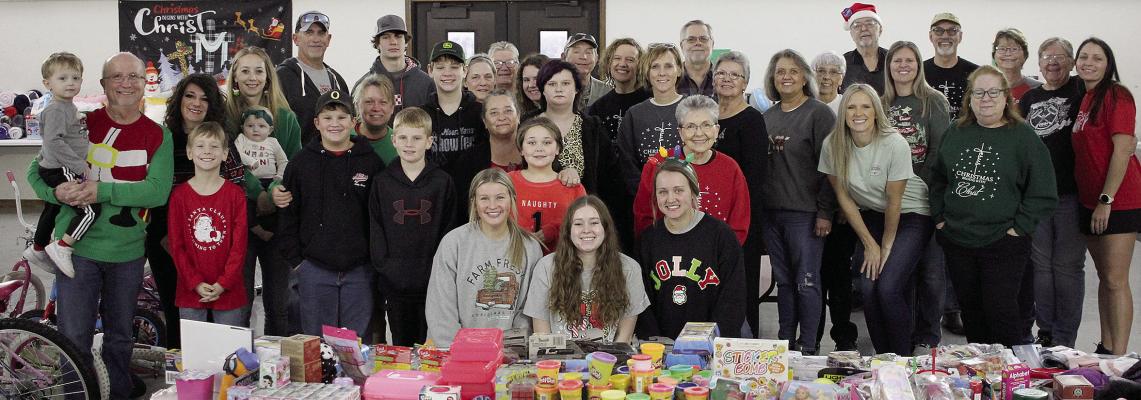 RICHMOND SALVATION ARMY and Rayville Christian Union Church volunteers gather to help families shop for their loved ones this holiday season. SOPHIA BALES | Staff