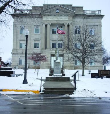 WALKWAYS HAVE been cleared. Snow starts to melt around the courthouse.