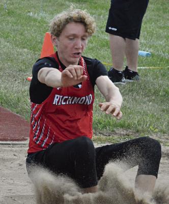 JACOB JOHNSON lands after a boys long jump attempt at Class 3 District 8 competition May 13 at Chillicothe High School. Johnson, a sophomore, finishes third and qualifies for the Sectional 4 meet Saturday at Warrensburg. SHAWN RONEY | Staff