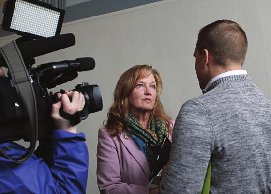 AFTER ANOTHER contentious meeting in February, Ray County Eastern Commissioner Luann Ridgeway answers questions for one reporter, but not others waiting to answer questions in the same hallway in the Clay County Administration Building on the Liberty Square. J.C. VENTIMIGLIA | Staff