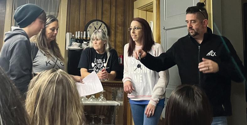 APEX PARANORMAL (AP) members Lillian Buchholz (from left), Jenni Panethiere, Ray County Museum Director Cathy Gottsch, AP members Shannon Johnson and Elijah Buchholz discuss ghost hunting rules and stories from their past adventures. SOPHIA BALES | Staff