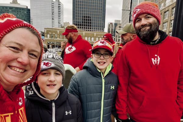 RICHMOND RESIDENTS Tricia, Jonah, Jacob and Jonathan Slade show Chiefs pride at the Kansas City Super Bowl LVII victory parade. TRICIA SLADE | Submitted